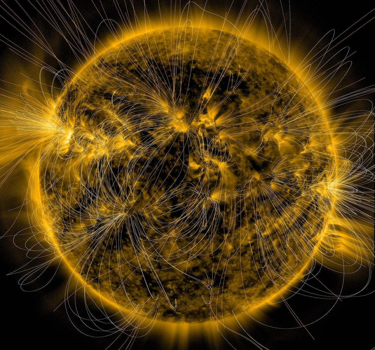 NASA SDO image of the sun at 171 angstroms (Fe IX) with magnetic field lines overlaid